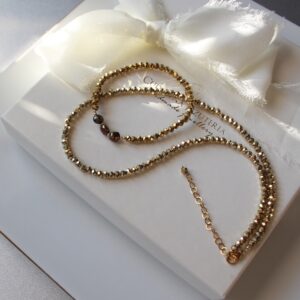 Zestaw złotej biżuterii naszyjnik i bransoletka z perłami