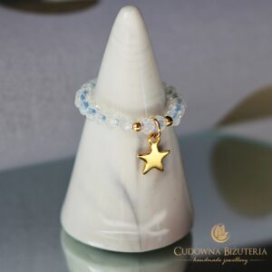 Pierścionek elastyczny kryształowy opal i złota gwiazdka