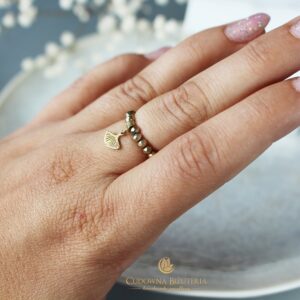 Złoty kryształowy pierścionek z zawieszką miłorząb