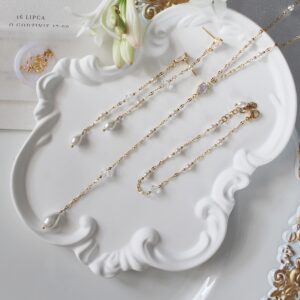 Naszyjnik na plecy z kryształami i perełkami kolekcja IRIS