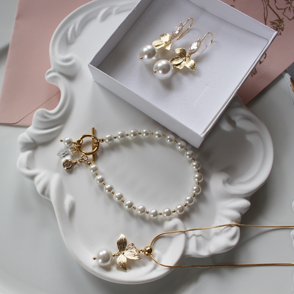 Kolczyki RUFINA z perłą, listkami i ozdobnym zapięciem - obrazek 7